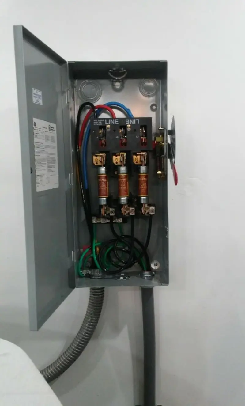 Three-phase disconnect switch installed for Smoke Detector Installation in Houghton
